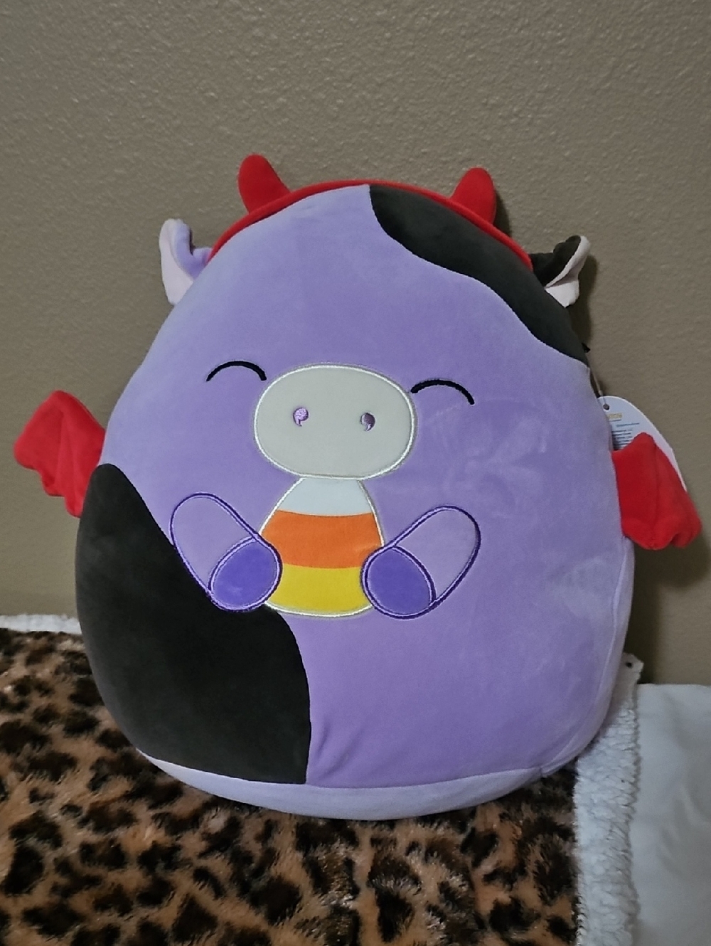Squishmallows Purple Cow with Black Patches and Red Wings